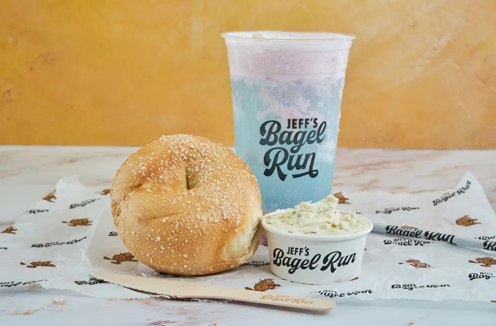 Bagel plate with coffee drink at Jeff’s Bagel Run (official brand photo)