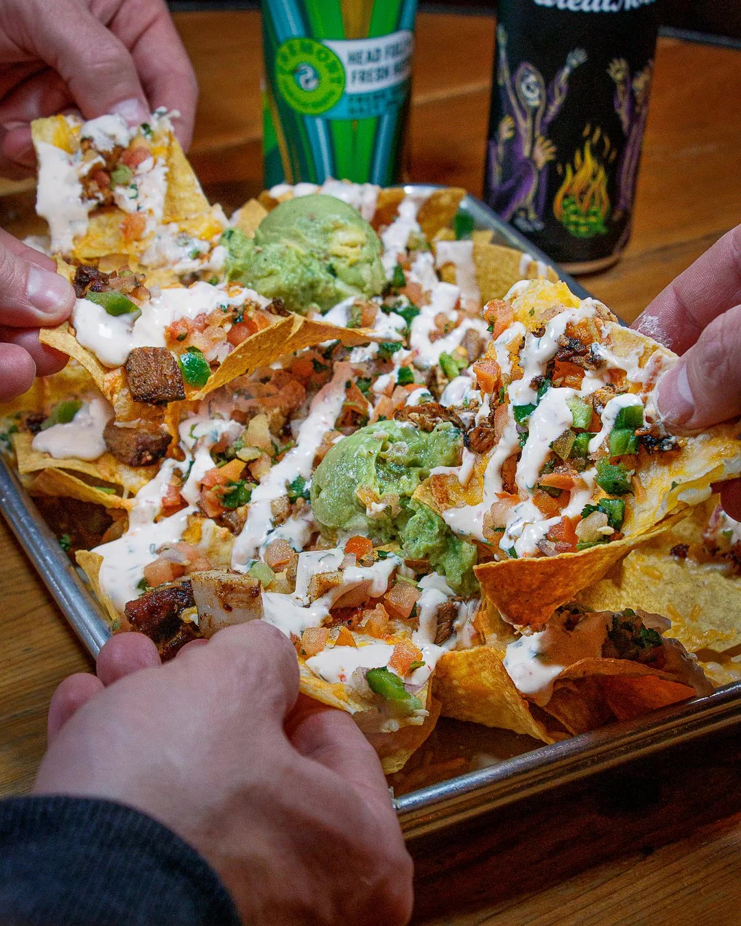 Shareable plates with beer at 595 Craft and Kitchen (official venue photo)