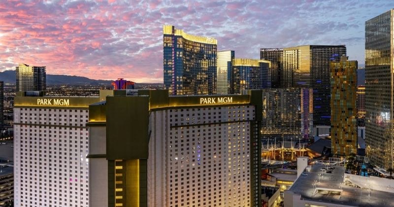 Park MGM hotel towers at sunset with the Strip skyline behind them (property photo)