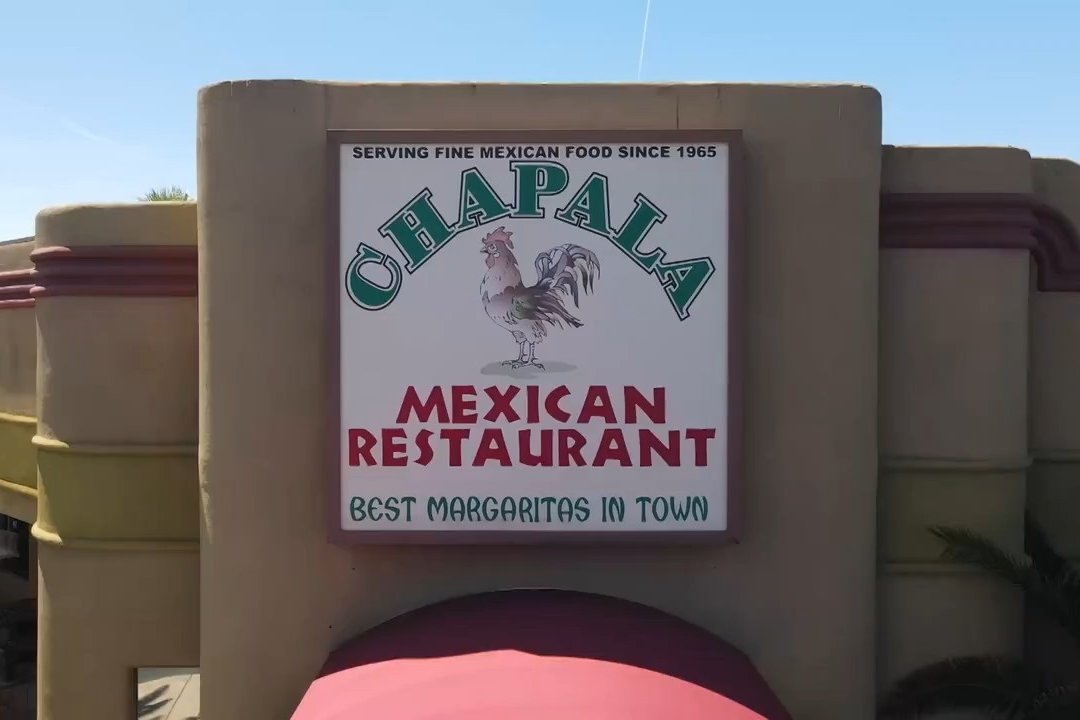 Chapala Mexican Restaurant's sign with a rooster, reading Serving fine Mexican food since 1965 and Best Margaritas in Town (Chapala's photo)