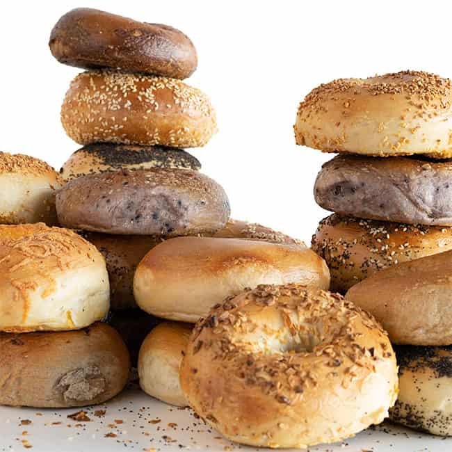 A stack of assorted bagels, including sesame, everything and plain (Siegel's Bagelmania photo)